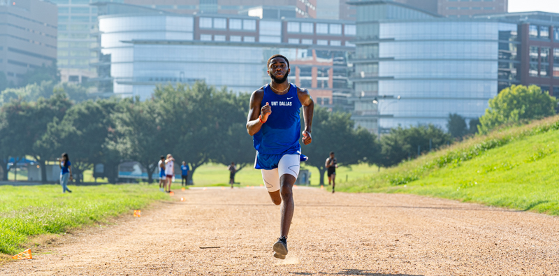 runner crossing finish line
