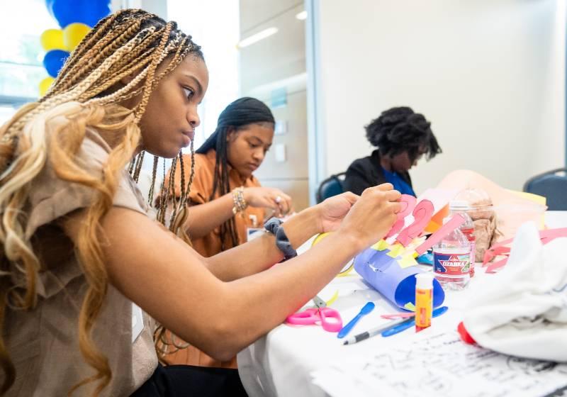 Aakira Blackmon with Classmate Asia Harvey at a Conrad Leadership Program Meeting