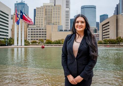 Alex Renteria Stands Near the Pond in Front of Dallas City Hall
