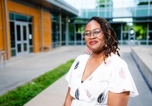 Chrishna Brooks in the Courtyard of Founders Hall