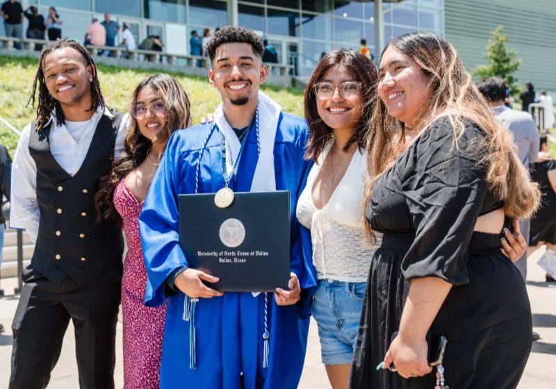 Graduates Celebrate Their Achievements and Experiences Outside the Texas Trust CU Theater