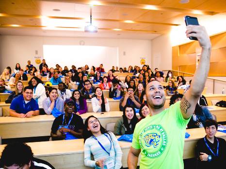 A Prospective Student Takes a Selfie During a Campus Open House Known as "True Blue"