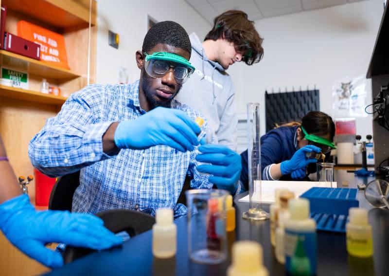 Students Doing Experiments in A Chemistry Lab