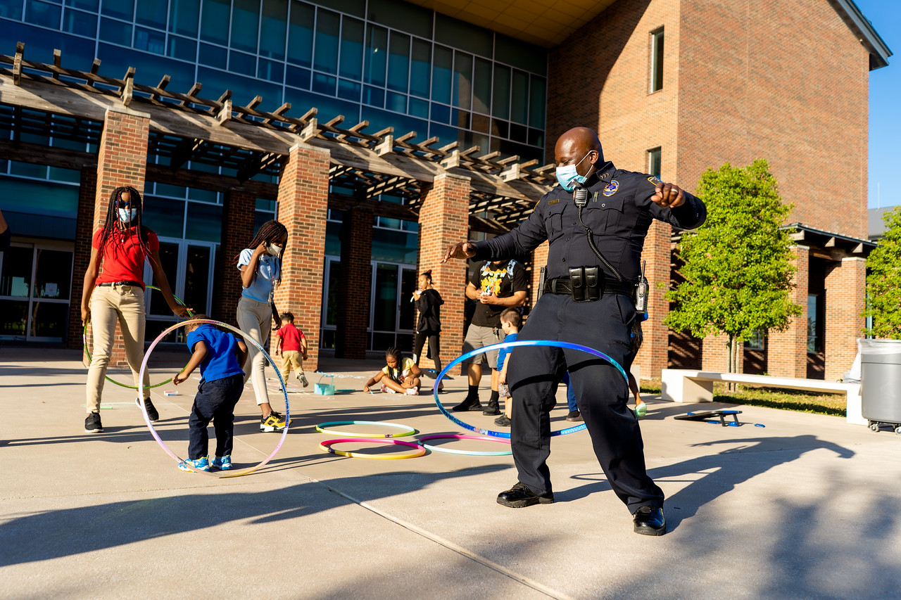 police hula hooping with kids