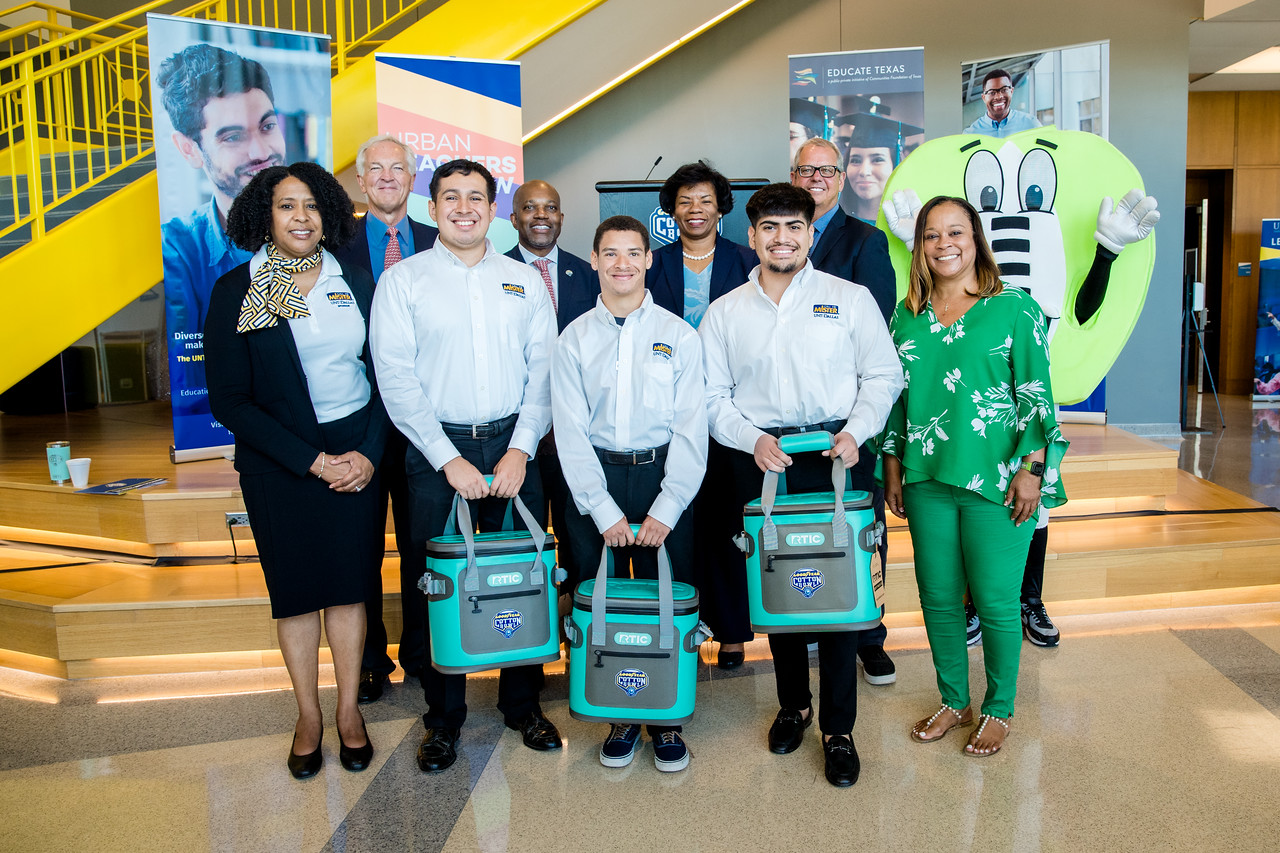 call me mister students in group with donors and staff