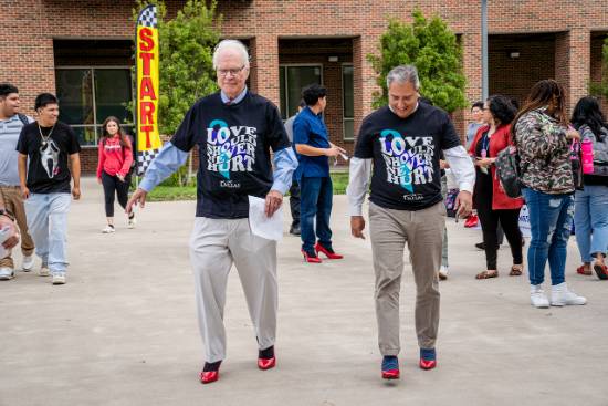 bob mong walks in heels