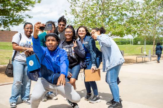 students taking selfie