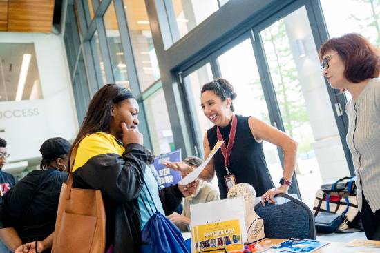 student receives information at Trailblazer 360