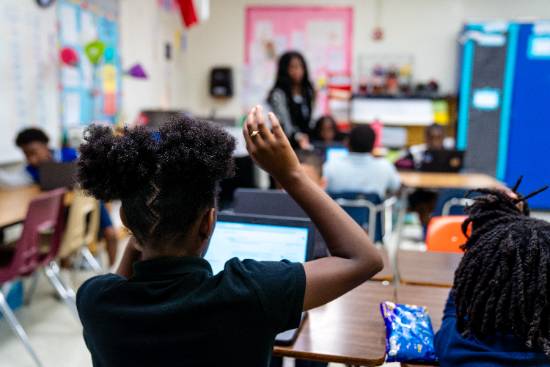 Inquiring Young Minds: A Dallas ISD Elementary Student Prepares to Ask Her Teacher a Question