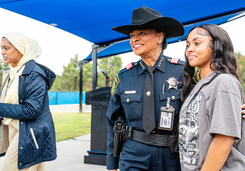 Dallas County Sheriff Marian Brown Poses for a Photo with a High School Student