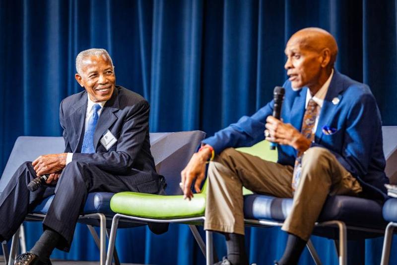 Hiawatha Williams (left), Founder of the Williams Chicken Restaurant Chain, Speaks at a School of Business Franchise Week Event