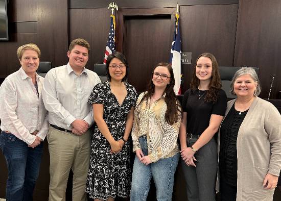 Coaches Shannon Conway (left) and Cynthia Fountaine (right) Beside the 2024 UNT Dallas College of Law Nuremberg Moot Court Team
