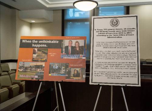 A Poster Shows TV Coverage of Attacks on Judges and Their Familes Across the U.S.