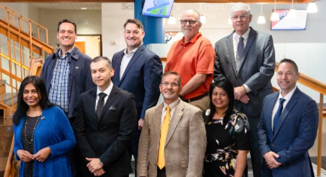 Dr. J. Eric Coleman, MSCJ Progam Coordinator and Dept. of Criminal Justice & Sociology Senior Lecturer (First Row Center) with the MSCJ Faculty
