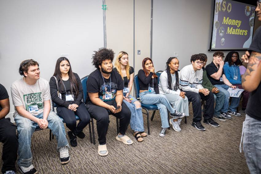 New Students Listen to an NSO Session About Spending and Saving Money
