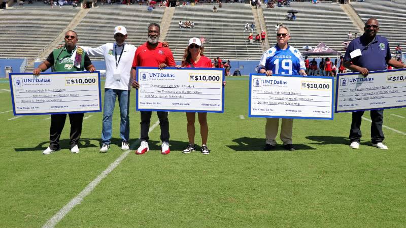 President Warren von Eschenbach, PhD, and Sen. Royce West Join Roland G. Parrish and the Duncanville and DeSoto Head Coaches for the Presentation of Four Checks for $10,000 Toward Scholarships for Future UNT Dallas Students