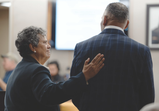 Professor Cheryl Wattley Comforting Ben Spencer During His Exoneration Hearing on August 29, 2024 (Courtesy: Dallas Morning News)
