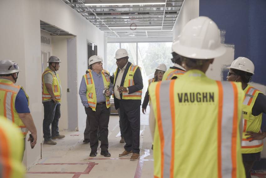 President Warren von Eschenbach and State Sen. Royce West Discuss Amenities of The New STEM Building During a Tour of The Construction