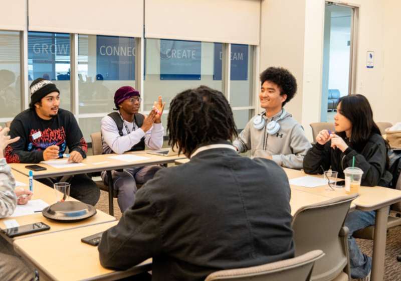 Myles Chung in a Science Classroom Discussion Group