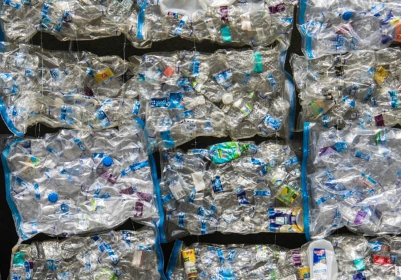 Plastic Waste Packed and Stacked; an Estimated 20 Million Tons Gets Added to the Environment Annually. Photo Courtesy: Nick Fawling