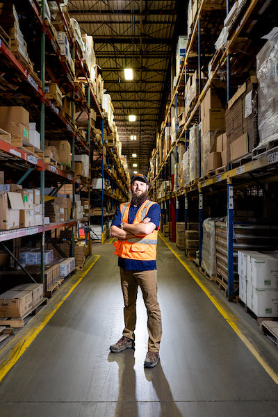 logistics alumni in large warehouse