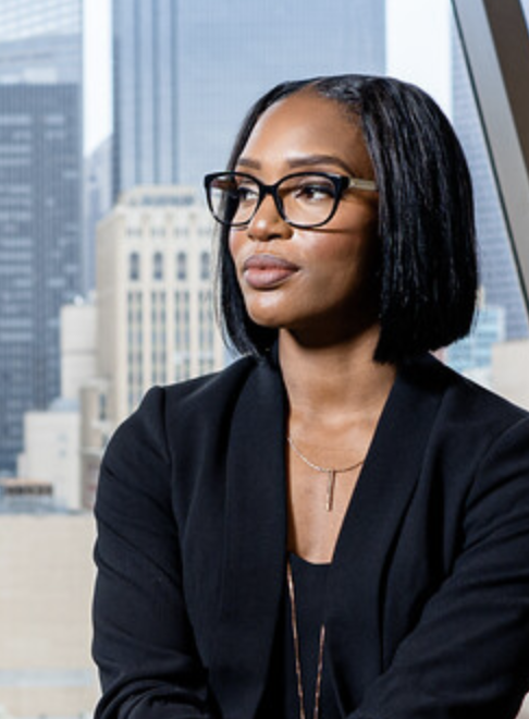 businesswoman with cityscape in background