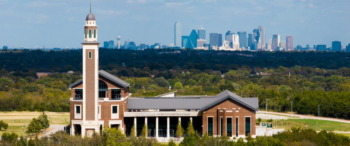 campus with dallas skyline