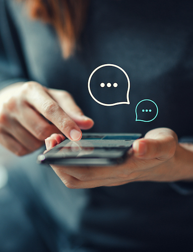 woman texting with dialogue icons overlayed