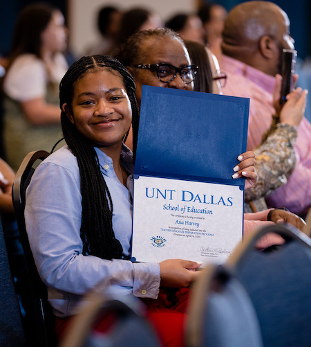 student with certificate